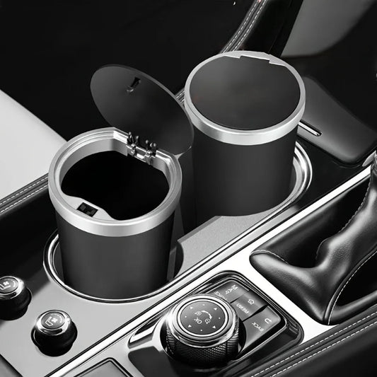 Car cup holder organizer with two compartments on a car dashboard.